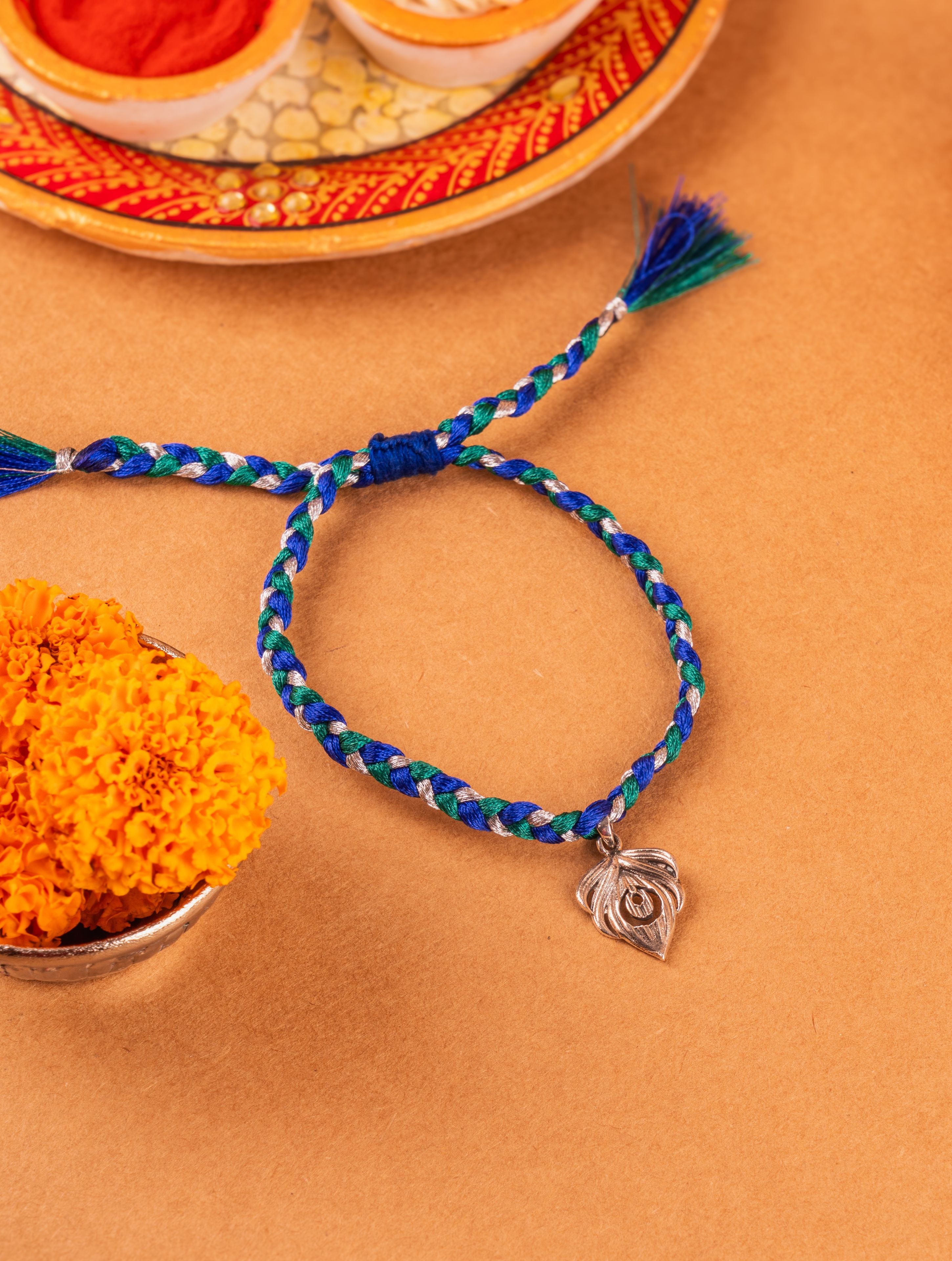 Silver Peacock Feather Lumba Rakhi