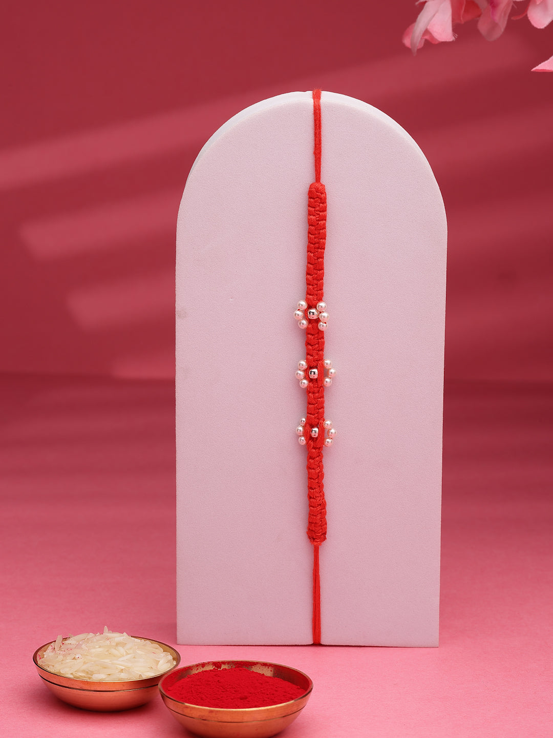 925 Sterling Silver Floral Pearl Rakhi in Red Macrame – Rhodium Plated