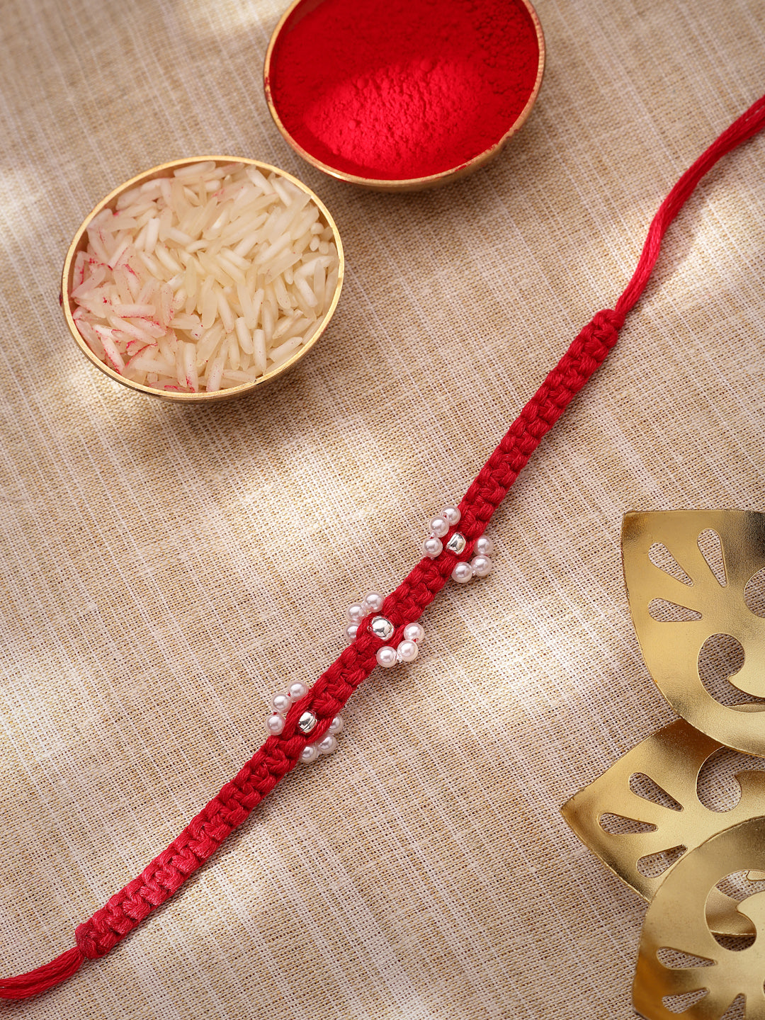 925 Sterling Silver Floral Pearl Rakhi in Red Macramé Thread – Rhodium Plated