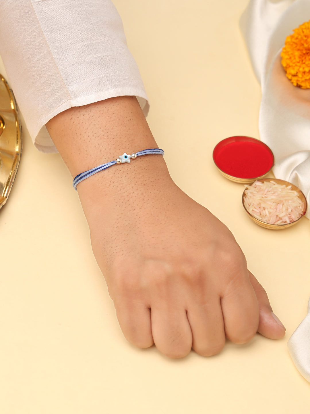 925 Sterling Silver Star Evil Eye Rakhi on Blue Thread