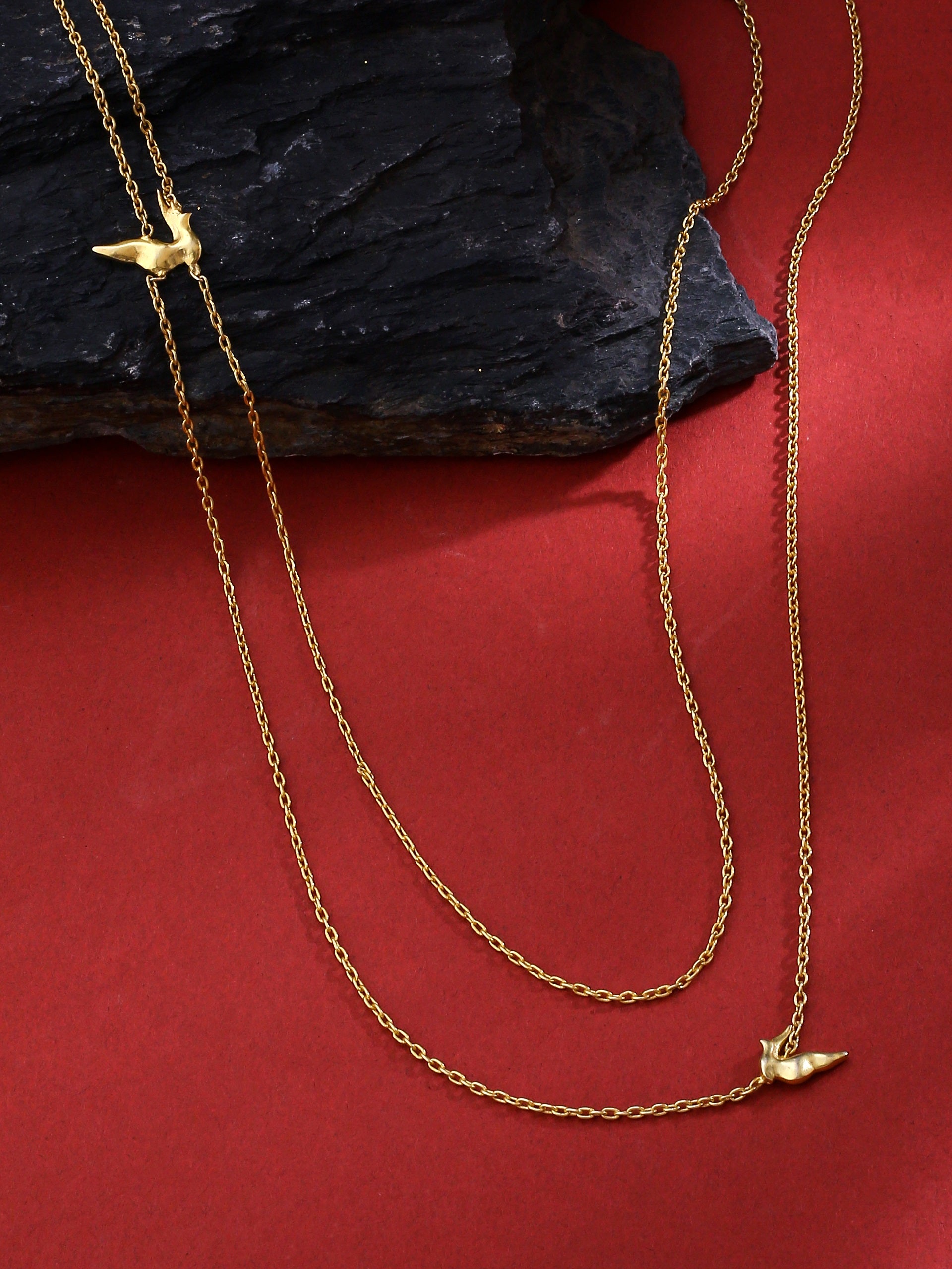 Zweireihige Halskette mit Mini-Vögel-Anhänger aus Gold