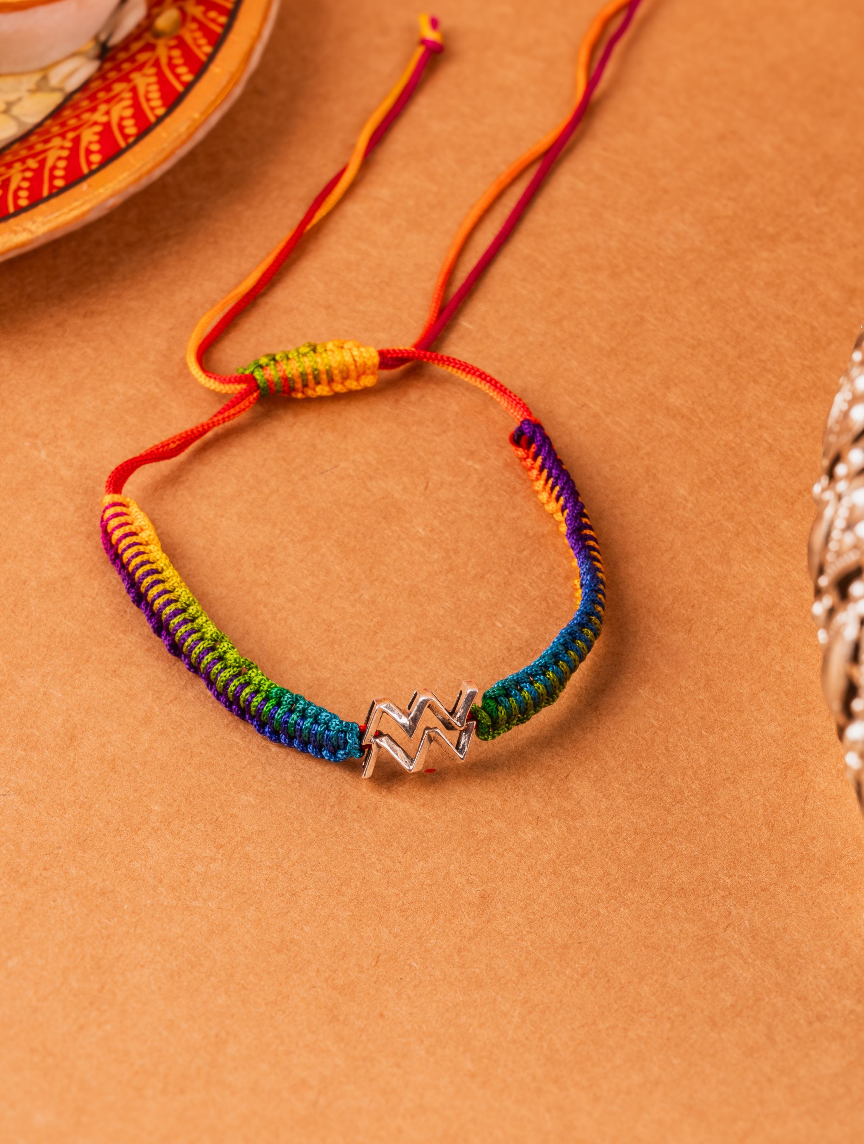 Silver Aquarius Rakhi