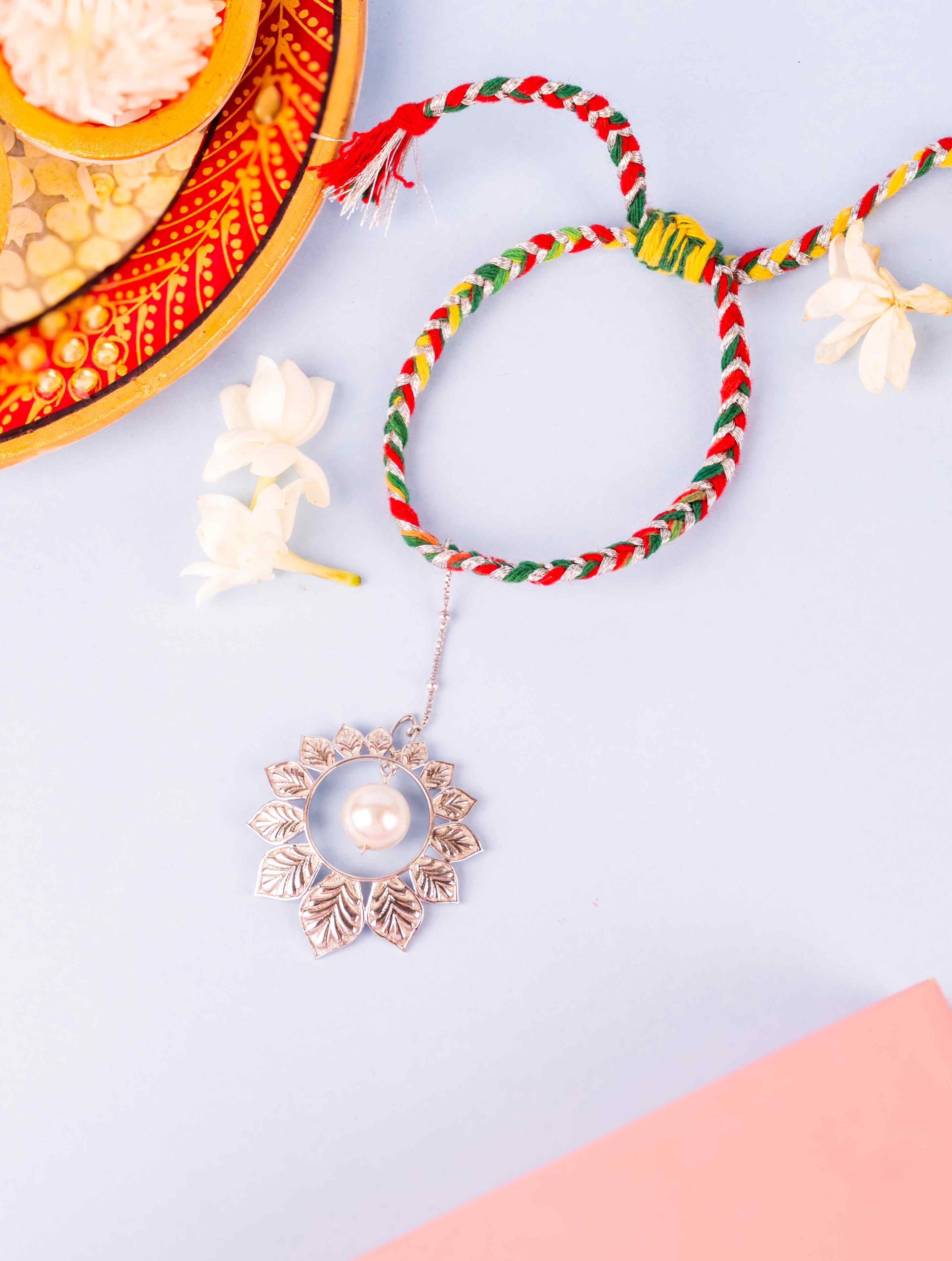 Floral Pearl Lumba Rakhi