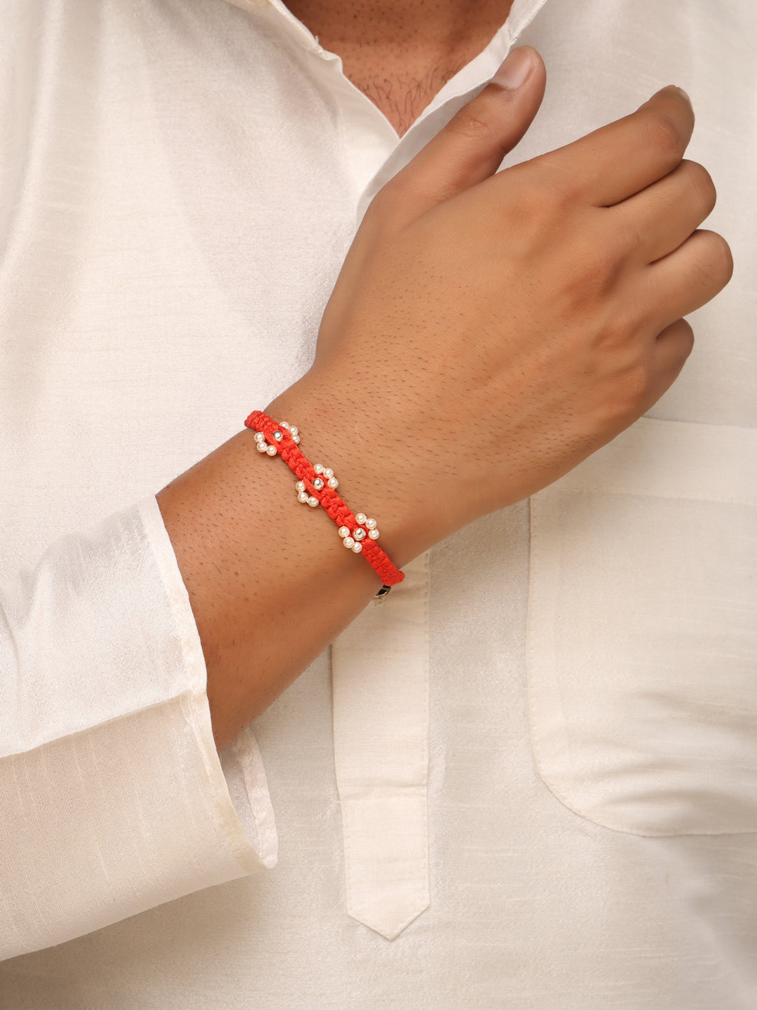 925 Sterling Silver Floral Pearl Rakhi in Red Macrame – Rhodium Plated