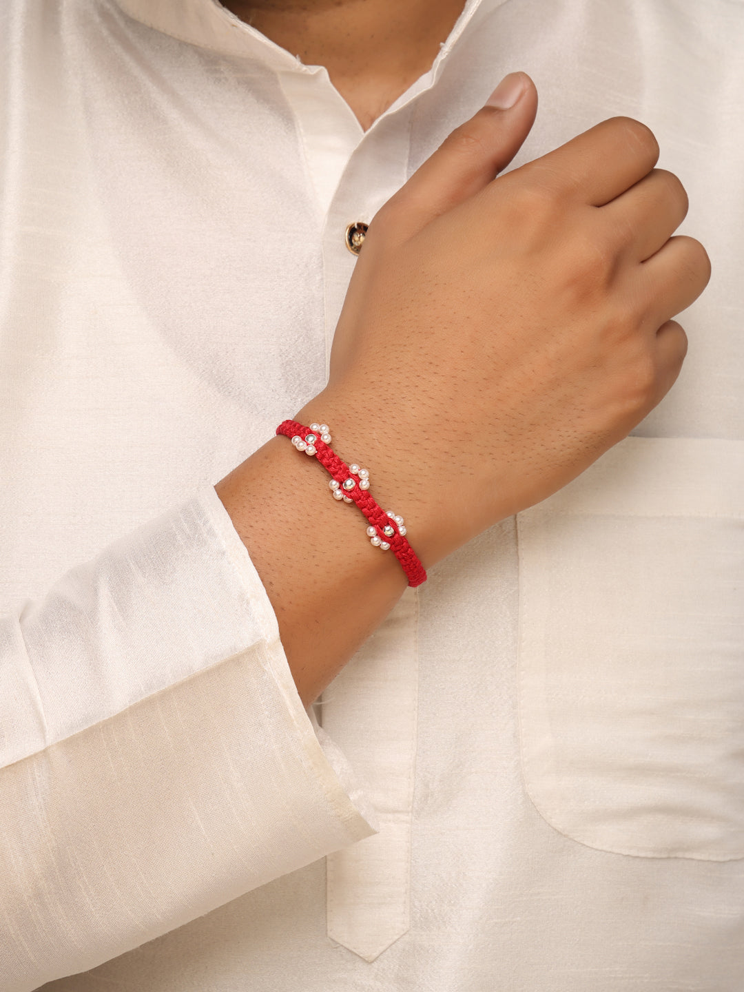 925 Sterling Silver Floral Pearl Rakhi in Red Macramé Thread – Rhodium Plated