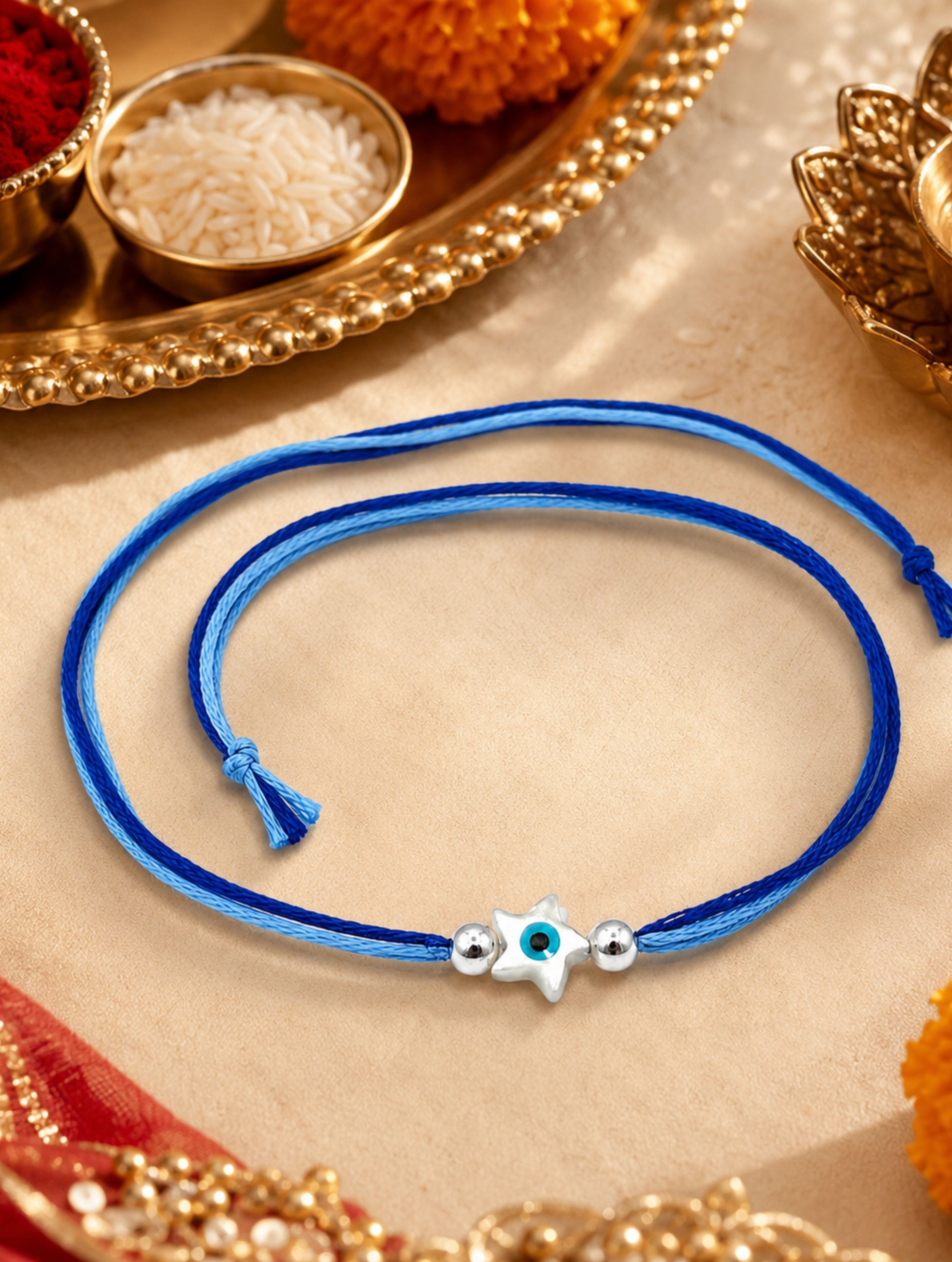 925 Sterling Silver Star Evil Eye Rakhi on Blue Thread