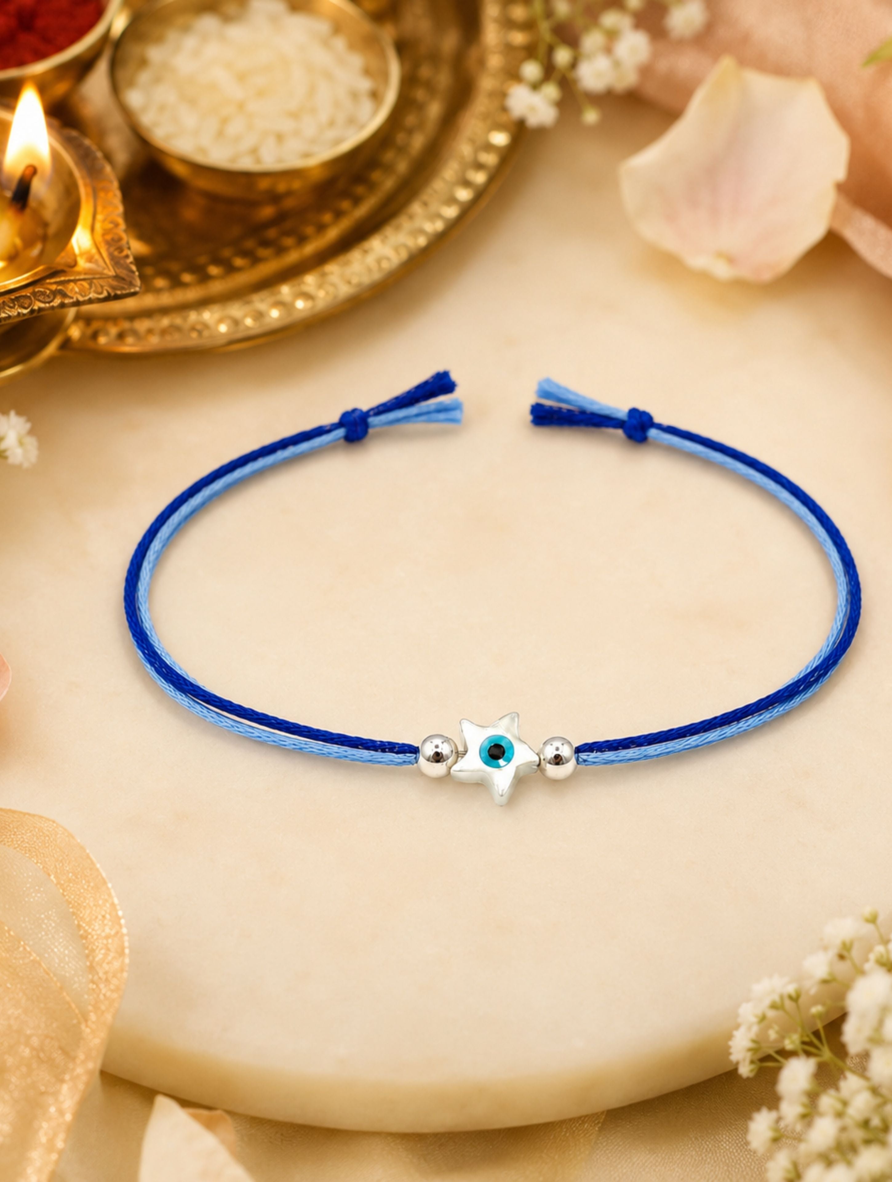 925 Sterling Silver Star Evil Eye Rakhi on Blue Thread