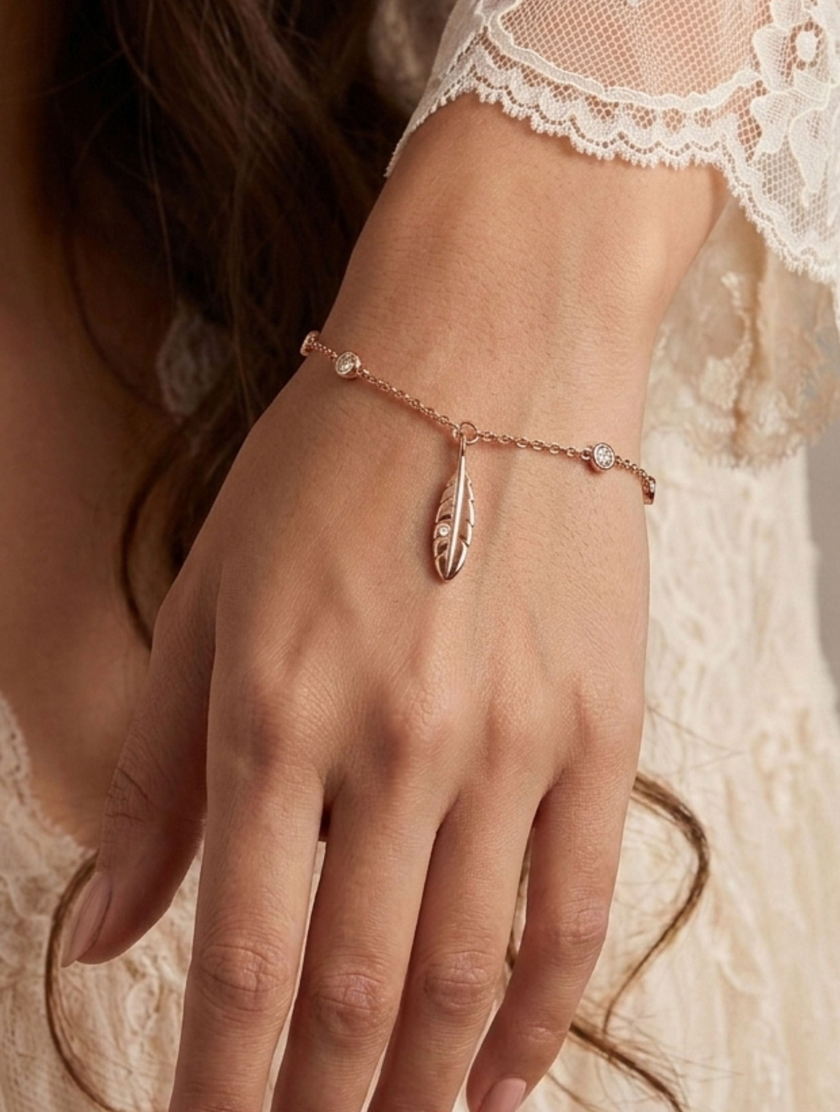 Rose Gold Feather & Shimmering White Stone Accent Charm Bracelet